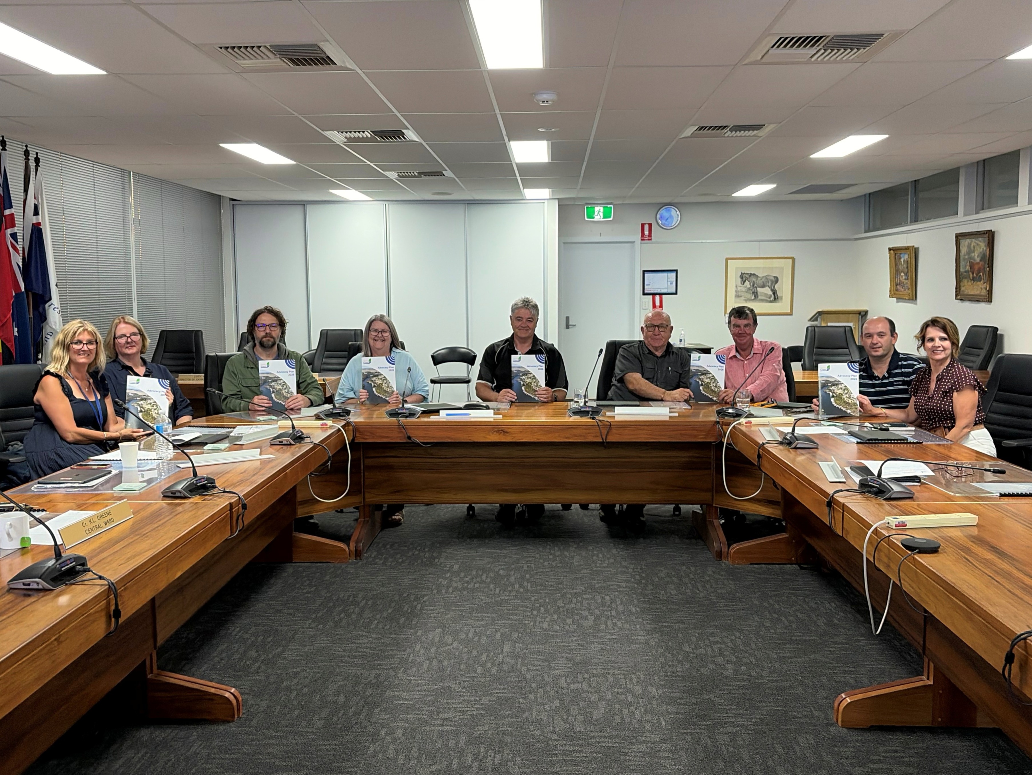 Mayor Kylie Boston and Councillors sit in the Council chamber, presenting the Advocacy Plan 2026 document. 